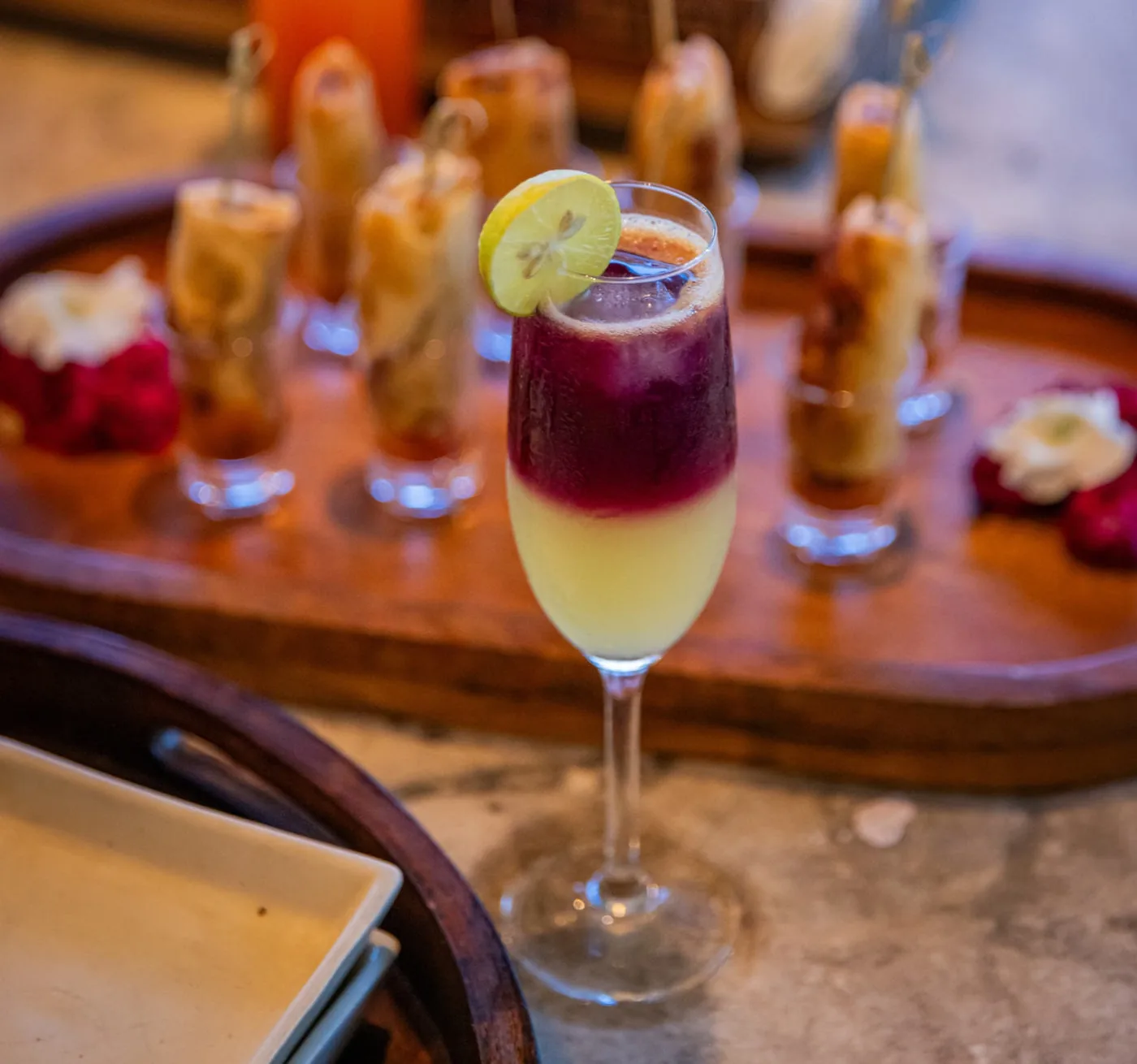 Cocktails served on a wooden tray