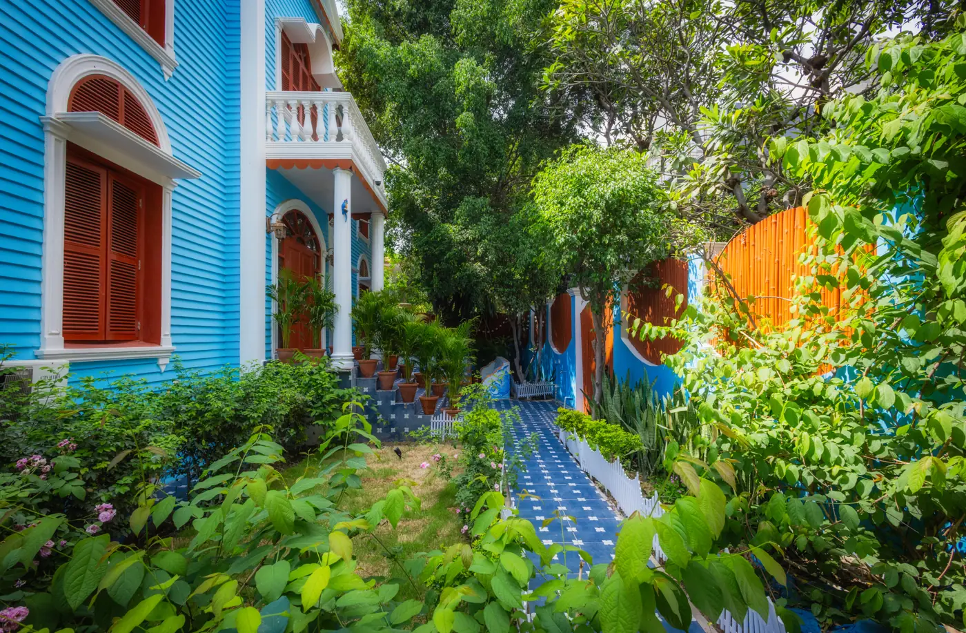 Garden path beside the blue villa