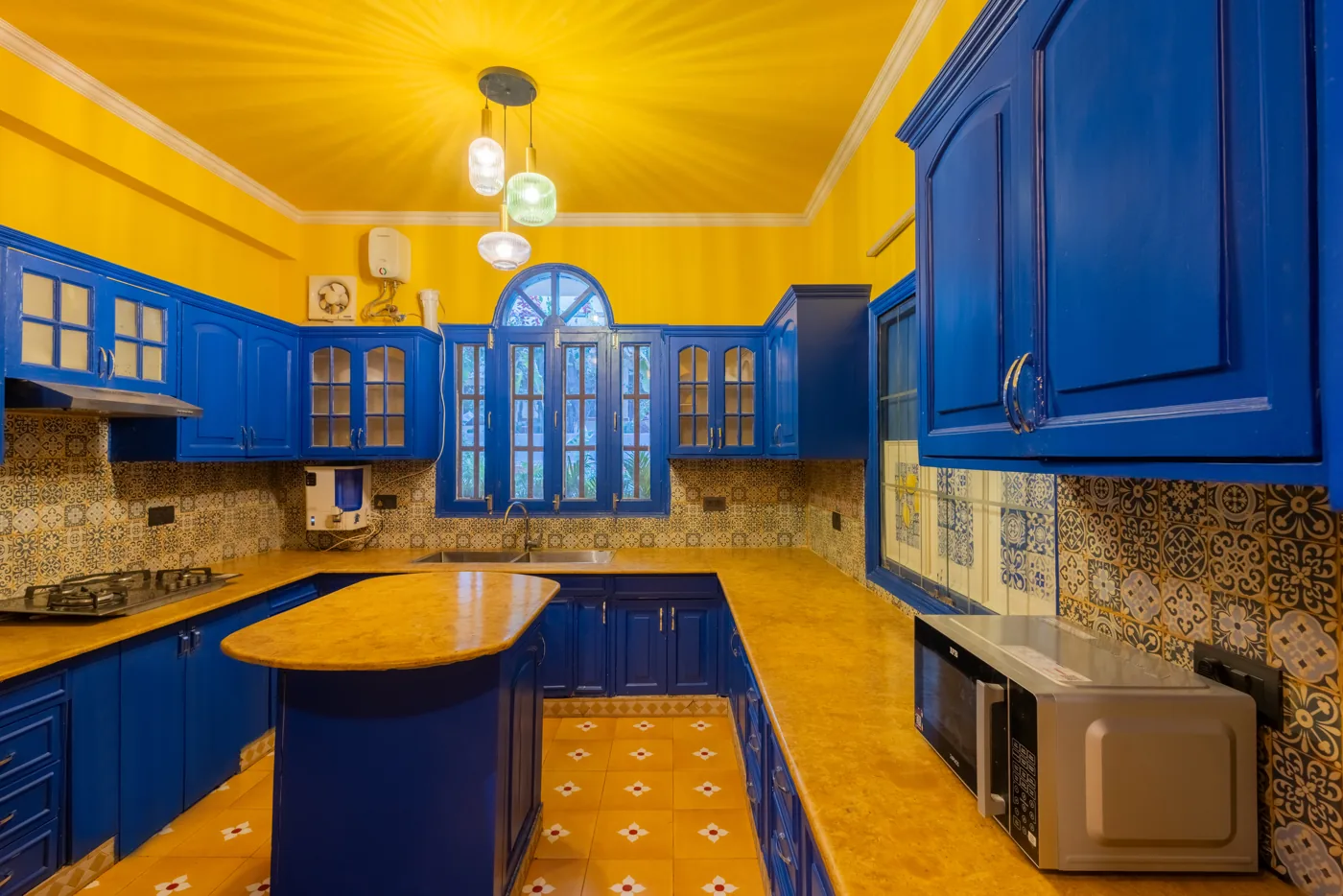 Royal blue and yellow kitchen