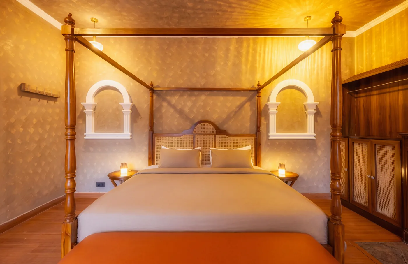 Bedroom with a wooden four poster bed